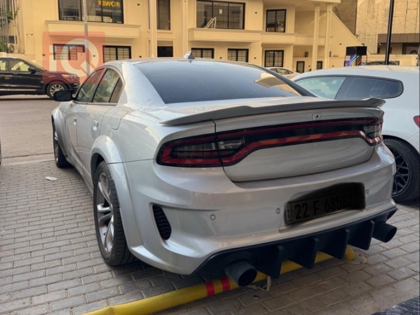 دۆج چارجەر